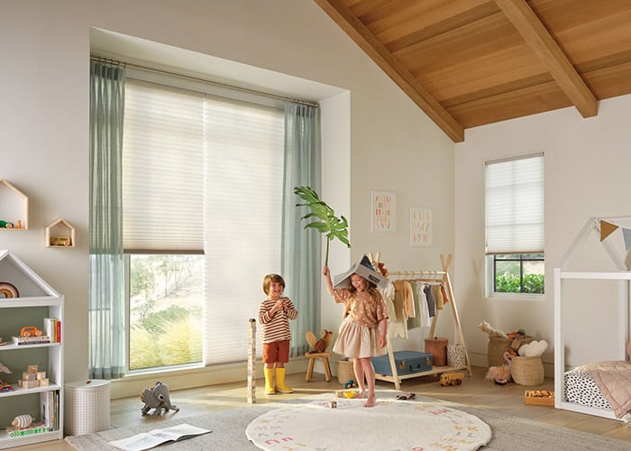 Bright, cozy kids' playroom with natural sunlight, plush carpet, and playful decor, perfect for children’s activities and imagination.