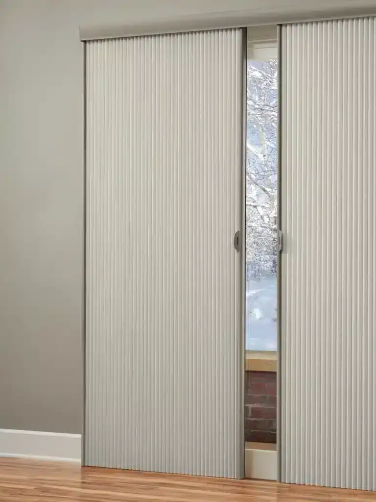 Efficient sliding door with frosted vertical panels, ideal for space-saving closets, modern interior, and contemporary home design.