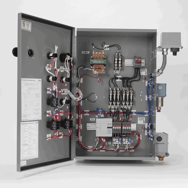 Open electrical panel with circuit breakers, wiring, and control components for power distribution and management.